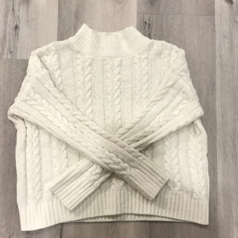 Cozy white knitted sweater